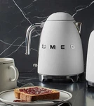 New Smeg Matte White Tea Kettle KLF03WHMUS Open. Price: $199.95.
