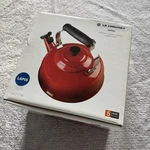 Creuset Enamel On Steel 1.7 Quart Whistling Tea Kettle Lapis Blue New Box Open. Price: $69.95.