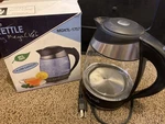 New The Kettle By Megachef," Model MGKTL-1757 Never Used 1.8 Tea/water/coffee Open. Price: $15.00.