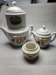 Vintage Porcelier China Coffee Maker, Tea Pot, Sugar Bowl Fireplace Scene Used. Price: $34.97.
