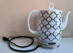 Bella Electric Ceramic 1.5 Tea Kettle Model KE7937-A White & Silver Tested Guc Used. Price: $94.99.
