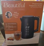 Beautiful Electric Kettle 1.7L 1500W Black Sesame Open. Price: $50.00.