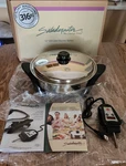 Saladmaster 12" Oil Core Electric Skillet 316TI SA0120CU New/open Box W/manual. Price: $550.00.