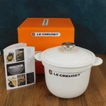 Le Creuset Cast Iron 2.25 Quart Rice Pot With Lid & Stoneware Insert, White. Price: $239.95.