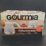 Gourmia Folding Travel Kettle .6 Qt White Silicone Collapses Dual Voltage Open. Price: $24.00.