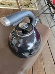 Circulon Whistling Black Stove Top Tea Kettle Enamel Steel 2 Qt Used. Price: $24.95.