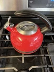 Empire Red Enamel Whistling Tea Kettle Pot 2QT. Stovetop Used. Price: $12.99.