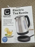 Century Appliance Electric Tea Kettle W/360 Degree Swivel Base - New Open Box. Price: $16.50.