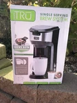 Tru Single Serving Brew System Model # CM-1177 New. Price: $30.00.