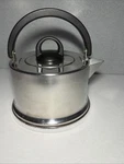 Progressive Stainless Steel Teapot Kettle Vintage Korea Black Handles Mcm Sleek Used. Price: $29.99.