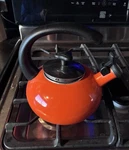 Rachael Ray Orange Whistling Tea Kettle Enamel Stainless Steel Ergonomic Handle Used. Price: $19.00.