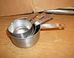 4 Measuring Cups 1/2 & 1/3 Cup- Stainless Steel Are Ekco Unbranded Used. Price: $12.99.
