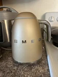 Smeg Cordless Electric Kettle Gold Model Stylish Kitchen Appliance Used. Price: $120.00.