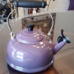 Creuset Purple Casis Enamel 2 Qt Whistling Tea Kettle W/ Handle & 4 Mugs Used. Price: $140.00.