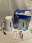 Braun 7-CUP Electric Boiling Water Kettle Pot Type 3217/WK200 Germany New Box. Price: $40.00.