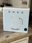 Smeg Navy 50S Retro 7 Cup Electric Kettle New In Box. Price: $150.00.