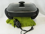Farberware 15 Inch Electric Skillet With Glass Lid Non-stick Dishwasher Safe Open. Price: $45.85.