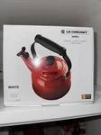 Brand New Creuset Enameled Steel 1.25 Qt. 1.1 L. Color White Tea Kettle. Price: $65.00.