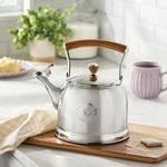 Pioneer Woman Stainless Steel 2.2 Quart Tea Kettle With Acacia Wood Handle New. Price: $60.95.