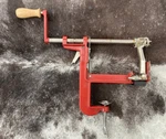 Apple Peeler Slicer Corer Under Table Mount, Progressive, Red With Wood Handle Used. Price: $9.95.