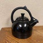 Creuset Enamel On Steel 1.7 Quart Demi Kettle Glossy Black Whistling Spout Used. Price: $34.95.