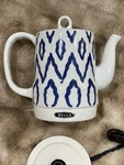 Bella 1.2 Liter Electric Ceramic Tea Kettle With Detachable Base & Boil Dry Used. Price: $89.00.