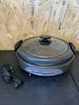 Zojirushi Gourmet D'expert EP-EVC25 Electric Skillet Titanium Non Stick Surface Used. Price: $39.99.