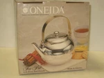 Nos Oneida Silverplated Tea Pot With Brass Bail Handle Usa Made New. Price: $50.00.