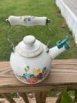 The Pioneer Woman Enamel-on-steel Floral Whistling Tea Kettle 2.5 Qt White Used. Price: $18.49.