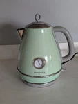 Evoloop 1.7L Electric Tea Kettle In Retro Green Color. Used. Price: $69.00.