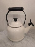 Creuset White Enamel Whistling Tea Kettle 1.1L/1.25QT Spout Used. Price: $30.40.