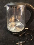 Bella 1.7L/7CUP Electric Glass Kettle With Auto Shut Off Led Light Used. Price: $30.00.