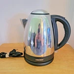 Aroma 1.8L Electric Kettle AWK-1258 With Power Base Tested Used. Price: $14.95.