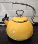 Yellow Retro Enamel Tea Kettle With Heart Knob Handle, 3.5 Qt Used. Price: $15.00.