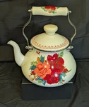 The Pioneer Woman 1.9 Qt Enamel-on-steel Floral Stove Top Tea Kettle White Used. Price: $15.99.