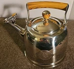 Pioneer Woman Stainless Steel 1.8-QUART Tea Kettle With Acacia Wood Handle Used. Price: $29.97.