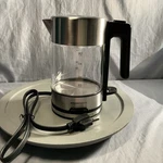 Amazonbasics Corded Electric Glass Kettle 1.0L Led Illuminated Black Nob Open. Price: $25.00.