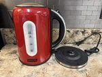 Dash DEK001RD Red Electric Kettle And Base Used Once. Price: $39.00.