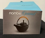 Kyoto Tea Pot By Nambe Gourmet Cast Iron Acacia Wood Handle New In Box Disc.. Price: $175.00.
