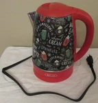 Bella Christmas Electric Kettle Cup Hot Cocoa Chocolate Stainless Steel 1.7L Used. Price: $40.00.