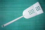 Vtg Ekco White Melamine Design: Ancona 2 Nyc Pierced Spatula 13 5/8" By 4" Used. Price: $9.50.