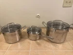 Emeril By All Clad 3 Piece Cookware Stainless Steel Pots & Pan W/lids Used. Price: $150.00.