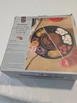 Brookstone 11-PC Electric Taco Bar Serving Set & Fondue Maker W/ Warming Pot New. Price: $25.00.