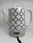 Bella 1.5L Electric Ceramic Tea Kettle Moroccan Trellis White Gray, Cute Tested Used. Price: $79.99.