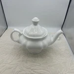 Bella Lux Collection. Solid White Porcelain Tea Pot With - Great Condition Used. Price: $20.00.