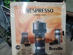 Nespresso Vertuo Machine Breville Open. Price: $125.00.