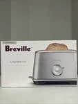 Breville Select Luxe 2 Slice Toaster, Almond Nougat New. Price: $150.00.