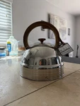 Well Equipped Kitchen Stainless Steel Whistling Tea Kettle Wood Grain Handle 3QT New. Price: $15.00.