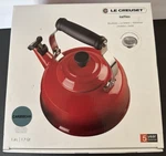 New! Creuset Whistling Tea Kettle With Metal Finishes 1.7 Qt. Caribbean Blue. Price: $94.00.