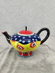 Joyce Shelton Teaparty Teapot Ceramic Multi Color Swirls & Dots Has Chip Used. Price: $28.98.